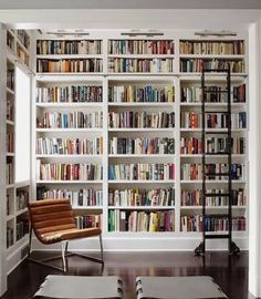 a living room filled with lots of books