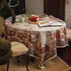 a table with a book and some books on it