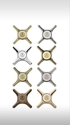 four different types of metal objects with peace signs on the top and bottom, all in different colors