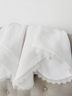 "White  Lace Swaddle Blanket is perfect breathable blanket for your little one. Great for car seat  Blanket, and  perfect baby shower gift. Blanket is handmade with white   double gauze  on both sides and white lace trim.   EMBROIDERY INFO: Please include the following at checkout in the  \"Notes to Seller Box\": 1. Name that you want on blanket 2. Thread color 3. Font # or letter style  4. Name to be in corner or middle down blanket (shown in pictures)  🌿 second photo shows how it will get bubbly fabric after drying in dryer and flat if you air dry  🌿Each blanket measures approximately 32\"x36\" 🌿 If you need custom size, please feel free to contact me.  🌿All items made by hand in smoke and pet free home.  🌿 Recommended care: For best results Machine or Hand Wash, Cold; Line Dry or i Muslim Baby Blankets, Hand Embroidered Baby Blanket, Newborn Style, Trim Embroidery, Lace Baby Blanket, Heirloom Baby Blankets, Vintage Baby Blanket, Tv Ideas, Down Blanket