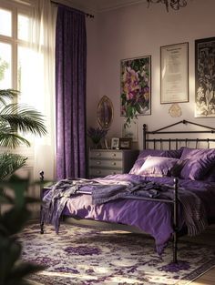 a bed room with a neatly made bed and purple comforter on top of it