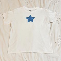 Star Tshirt Fourth Of July Top Blue Star Tee Baby Tee Size Small Brand New, Custom Made By Me Message Me For A Different Size! Fourth Of July Shirt, Graphic T-Shirt, Baby Tee, Fourth Of July Top, Fourth Of July Outfit, Cowboy Boot Tee, America Top, Usa T-Shirt, Red White And Blue Shirt, Flag T-Shirt, Fourth Of July Graphic Tee, Fourth Of July Baby Tee, Fourth Of July Style, Fourth Of July Celebration Shirt, Patriotic Outfit, Usa Shirt, Fourth Of July Vintage Shirt, Fourth Of July Retro Shirt, Fo Summer Cotton T-shirt With Star Patch, Cotton Short Sleeve T-shirt With Star Print, Casual Crew Neck T-shirt With Star Patch, Blue Star Print Summer Tops, Blue Star Print Tops For Summer, Blue Cotton Star Print Tops, Cotton Shirt With Star Print For Summer, Casual White T-shirt With Star Patch, Short Sleeve Cotton Top With Star Print