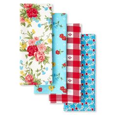 four napkins with flowers and gingham checks on the front, one in red, one in blue