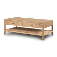 an oak coffee table with two drawers on the bottom and one drawer open to reveal a shelf