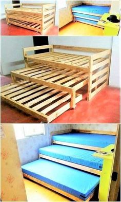 the bed frame is made out of pallets and has blue mattresses on it