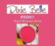 a pink paint with the words dixie bell peony on it and an apple next to it