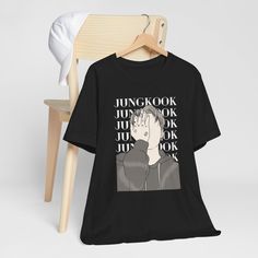 JungKook Shirt, JK Shirt, Kpop Shirt, Kpop Army tshirt, Unisex Jersey Short Sleeve Tee, Kpop Merch, Army Gift, Kpop Fanart This classic unisex jersey short sleeve tee fits like a well-loved favorite. Soft cotton and quality print make users fall in love with it over and over again. These t-shirts have-ribbed knit collars to bolster shaping. The shoulders have taping for better fit over time. Dual side seams hold the garment's shape for longer. With its cute and beautiful design for K-pop fans, i Kpop Short Sleeve Shirt With Graphic Print, Kpop Style Shirt For Streetwear With Short Sleeves, Kpop Style Short Sleeve Shirt For Streetwear, Black Kpop Tops With Character Print, Black Kpop Style Top With Character Print, Kpop Character Print Short Sleeve Tops, Jungkook Shirt, Army Tshirt, Kpop Tshirt