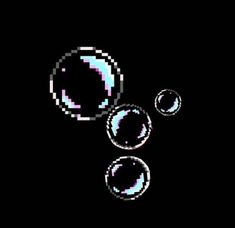 three bubbles floating in the air on a black background with blue and white circles around them