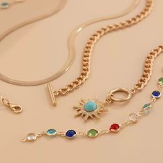 This stunning Regina Layered Lariat Necklace Set brings a playful yet elegant touch to any ensemble. Featuring a multi-color beaded design, this layered necklace set is perfect for adding a splash of color to your outfits. The lariat drop design adds a chic and sophisticated look, making it ideal for both casual wear and special occasions. The set includes two necklaces, each offering a different length for an effortlessly layered appearance. Details: Material: Gold-plated brass with colorful beads Set weight: 42.4g (1.49oz) Short necklace length: 37cm + 7cm extension (14.5in + 2.7in) Long necklace length: 70cm (27.5in) Pendant size: 2.5cm x 0.98in Chain thickness: 0.6cm (0.23in) Eye-catching multi-color bead accents Layered lariat drop design for a trendy and unique look Missy Jewelry Nec Elegant Multicolor Metal Chain Necklace, Trendy Metal Lariat Necklace, Elegant Multicolor Metal Beaded Necklaces, Elegant Multicolor Lariat Jewelry, Adjustable Multicolor Metal Chain Necklace, Multicolor Long Metal Chain Necklace, Multicolor Jewelry With Dangle Adjustable Chain, Trendy Multicolor Charm Necklace With Adjustable Chain, Trendy Multicolor Charm Necklaces With Adjustable Chain