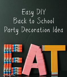 an easy back to school party decoration idea with pencils and erasers on a blackboard