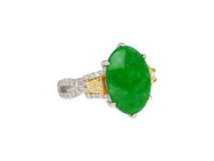 "Item Details: - Type: Cocktail Ring - Metal: 18K White, Yellow Gold  - Weight: 5.66 Grams  - Style: Interlocking  - Setting: Prong - Size: 6  - Measurements: 2.5 x 2 CM  Center Stone Details:    - Type: Jadeite Jade - Carat: 4.76 - Cut: Cabochon, Oval - Color: Green  - Measurements: 16 x 10.15 mm  Side Stone Details(1):  - Type: Diamond  - Color: Yellow  - Carat: 0.44 CTTW - Cut: Trapezoid - Quantity: 2  - Measurement: 4 x 3.5 mm  Side Stone Details(2):  - Type: Diamond  - Carat: 0.34 CTTW - Cu Green Multi-stone Oval Diamond Ring, Oval Green Multi-stone Diamond Ring, Green Oval Multi-stone Diamond Ring, Green Multi-stone Marquise Jewelry, Oval Multi-stone Emerald Ring, Oval Green Diamond Ring Hallmarked, Oval Green Hallmarked Diamond Ring, Hallmarked Green Oval Diamond Ring, Side Stone Ring