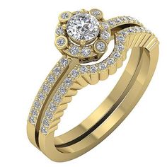 a yellow gold wedding ring set with an oval center stone surrounded by round brilliant cut diamonds