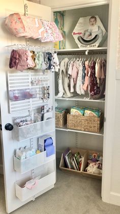 a baby's closet with clothes, toys and other items on shelves in it