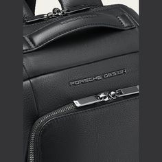 Soft, completely grained calfskin meets perfect amenities: the Porsche Design Roadster Leather collection was designed exclusively for the high demands of business travelers. Dedicated to perfection and excellence, all products have spacious compartments, easy access pockets on the front and padded notebook pockets secured with webbing. Laptops fit the dedicated compartment perfectly, a must-have for any commuter and executive. All compartments, expandable pockets and useful side pockets prov... Modern Backpack With Zipper For Business Trips, Modern Backpack For Business Trips With Zipper Closure, Modern Backpack With Zipper Closure For Business Trips, Elegant Business Leather Backpack With Zipper, Luxury Backpack For On-the-go, Modern Soft Leather Backpack, Elegant Business Backpack With Zipper Closure, Luxury Backpack With Leather Lining For On-the-go, Modern Business Backpack With Leather Backing