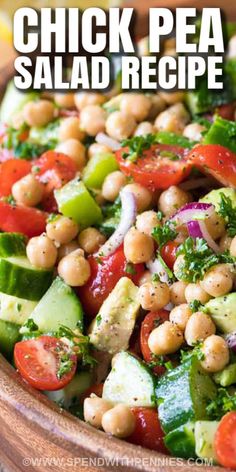 chickpea salad in a wooden bowl with the title text overlay reads chicken pea salad recipe