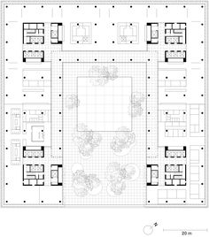 the floor plan for an office building with several rooms and two courtyards, all in black and white