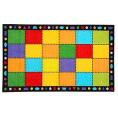 a colorful rug with squares and dots on it