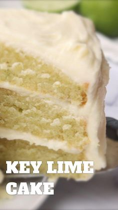 a close up of a slice of cake with the words key lime cake on it