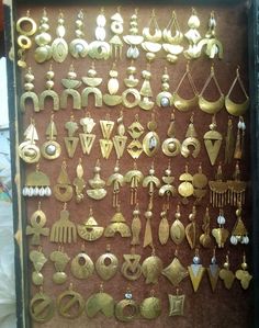 This listing comes 20 pairs of earrings as shown. Made of brass. For more earrings, follow the link. https://www.etsy.com/listing/877330893/african-unique-earrings-gift-for-her?ref=shop_home_active_8 Dhl shipping express **Happy shopping** Thank you. Bronze Metal Hoop Earrings, Unique Plug Earrings For Festivals, Brass Drop Earrings For Festivals, Festival Gold Metal Earrings, Gold Metal Earrings For Festivals, Handmade Drop Danglers, Festival Plug Dangle Earrings, Vintage Hoop Earrings For Festivals, Metal Earrings For Pierced Ears For Festivals