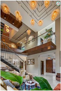 a living room filled with furniture and lots of lights