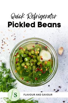 pickled beans in a mason jar with herbs and seasoning on the side text reads quick refrigerator pickled beans