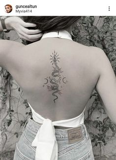 a woman with a tattoo on her back