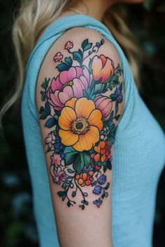 a woman with a flower tattoo on her arm