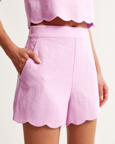 Elevate your summer wardrobe with the Abercrombie & Fitch Women's Premium Linen Scallop-Hem Tailored Shorts in a delightful Soft Purple hue. These shorts blend elegance with comfort, crafted from 100% linen with a cotton lining for a breathable feel.

- Size: 32
- Color: Soft Purple
- Material: Body: Linen, Lining: Cotton
- Gender: Female
- Features: Ultra high-rise, Elasticated waistband with zipper, Pockets, Fashionable scallop hem

Perfect for both casual outings and chic events, these tailor Spring Linen Shorts With Short Inseam, Linen Shorts With Short Inseam For Spring, Fitted Linen Shorts For Spring, Spring High Waist Linen Shorts, High Waist Linen Shorts For Spring, Scallop Hem, Women's Bottoms, Tailored Shorts, American Clothing