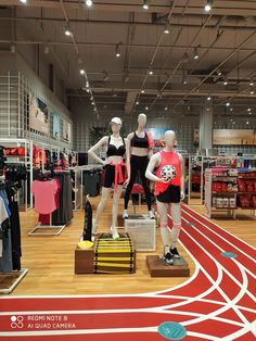 mannequins in sports bras and shorts on display