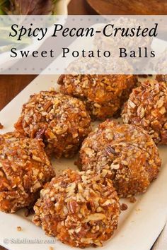 sweet potato balls with pecan - crusted toppings on a white platter