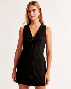 Our new vest mini dress in our soft linen-blend fabric, featuring button-through detail, non-functional front pockets and v-neckline. Black Linen Dress, Outfit Plan, Vest Designs, Black Linen, Fit N Flare Dress, Vest Dress, Evening Wear, Modern Woman, Abercrombie Fitch