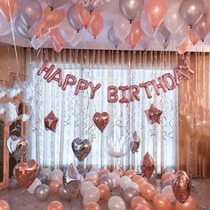 a birthday party with balloons and streamers