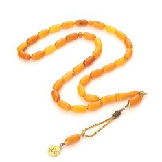 Unique and one-of-a-kind Islamic rosary beads, made of genuine Baltic amber. The collectible Original rosary. From a long time, white amber darkens and acquires a yellow-brown color. The tasbih is carved from genuine amber stones. Amber Tesbih are collected on a high-quality double thread and Handcrafted Unique Tassels. The rosary looks perfect and will be a beautiful accessory giving the natural energy and warmth of Amber. Tasbih gives an incredibly pleasant feeling.    This special Islamic pra Traditional Rosary With Gemstone Beads For Healing, Traditional Gemstone Beads Rosary For Healing, Amber Spiritual Rosary For Healing, Spiritual Amber Rosary For Healing, Antique Amber Beads For Gift, Amber Spiritual Healing Rosary, Traditional Amber Rosary With 8mm Beads, Traditional Amber Rosary, Traditional Amber Rosary With Round Beads