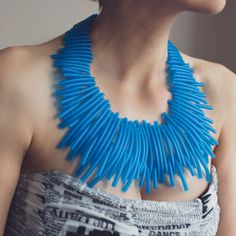 Chic statement blue necklace. You will love wearing this jewelry piece for special occasions. The necklace is possible also in magenta, black and royal blue. MATERIALS: Rubber cord MEASHUREMENTS: Bib: 24 cm x 10 cm or 9,44" x 3,9" Necklace length 60 cm or 23,6" HOW TO CARE: Keep jewelry in individual zip lock bags. Avoid mechanical impact and contact with cosmetics. If necessary, wipe the spot with napkin.  PACKAGE: All jewelry are sent in PVC storage bag with branded sticker. Don't hesitate to Handmade Bold Blue Jewelry, Bold Blue Jewelry For Party, Bold Handmade Blue Jewelry, Quirky Ring, Pvc Storage, Bib Necklaces, Chic Jewelry, Blue Necklace, Keep Jewelry