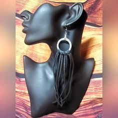 Genuine Black Leather Fringe Tassel Earrings With Silver Hoop Engraved With Leaves On A Hypoallergenic Earring Hooks #Countryjourneyboutique #Festivalearrings #Fringeearrings #Leatherearrings #Countrygirl #Leatherfringe #Silverearrings Elegant Black Leather Earrings, Elegant Leather Fringe Jewelry, Leather Dangle Jewelry For Party, Black Fringe Dangle Jewelry, Black Dangle Jewelry With Fringe, Party Leather Dangle Jewelry, Trendy Black Fringe Jewelry, Black Fringe Jewelry, Chic Black Earrings With Fringe