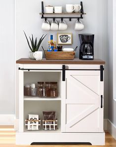 a coffee bar with shelves and cups on it