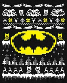 the batman christmas sweater is shown in black and white, with an ugly yellow bat on it