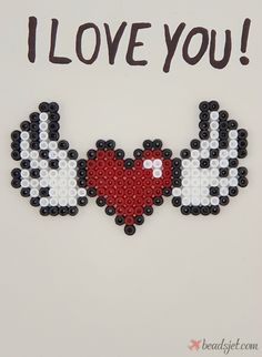 i love you beaded card with two hearts and the words'i love you '