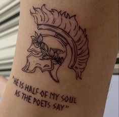 a woman's leg with a tattoo saying he is half of my soul as the post - say