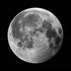 the full moon is shown in black and white