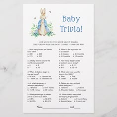 the baby trivia game is shown on top of a marble table with blue accents