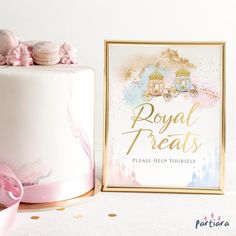 there is a white cake with pink frosting on it and a gold framed sign that says royal treats please help yourself