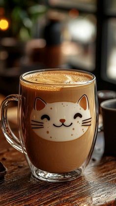 a coffee cup with a cat drawn on it