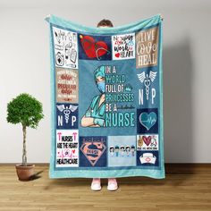 a woman standing in front of a blue blanket with various medical related items on it