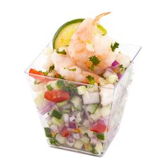 a salad with shrimp and vegetables in a plastic container on a white background, ready to be eaten