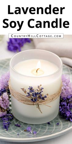 lavender soy candle sitting on top of a plate