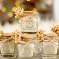 small jars with labels and twine tied around them