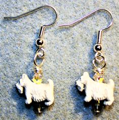 These are earrings for the Scotty dog fan! The Scotty beads are ceramic, and they are made in Peru. They are accented with glass beads and Swarovski Fernandina Beach Florida, Scotty Dog, Fernandina Beach, Dog Earrings, Scottie Dog, Stationery Items, Who Said, Beach Florida, Peru