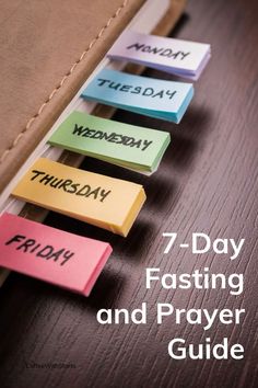 seven days fasting and prayer guide on a wooden table with the title 7 - day fasting and prayer guide