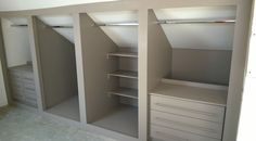 two white closets with shelves and drawers in the middle of each one's closet